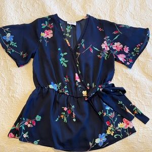 Navy and floral V neck blouse.